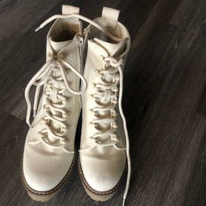 White zip-up and lace-up boots